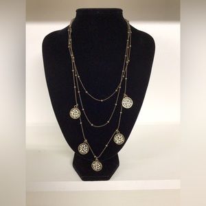 Layered chain necklace with boho medallions